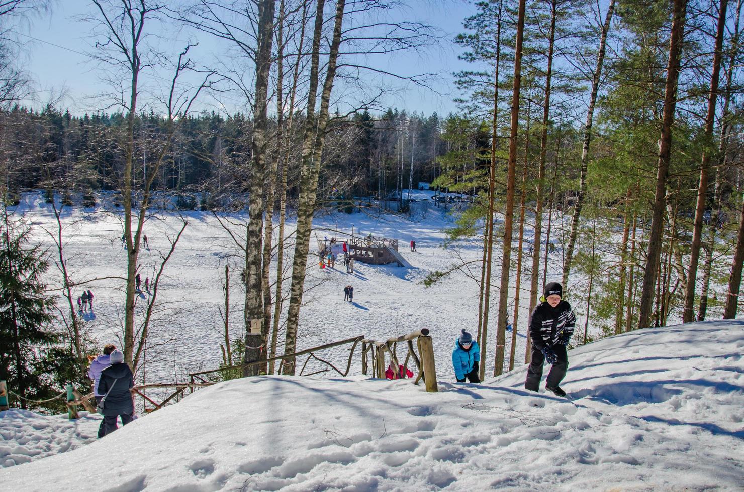 winter park with snow slides, walking in the park photo