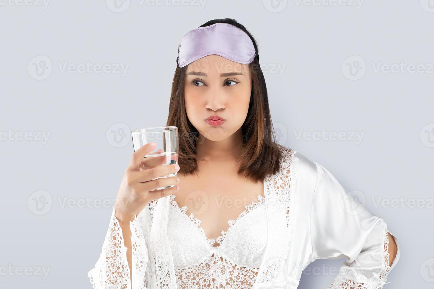 Woman rinsing your mouth with mouthwash photo