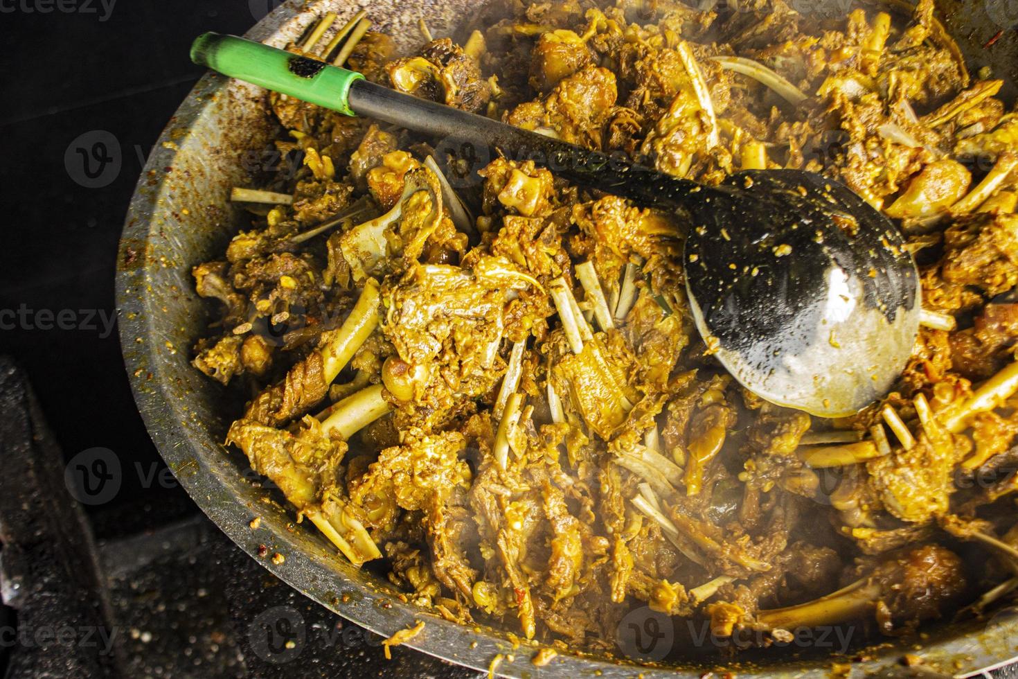 tengkleng kambing or goat tengkleng is a kind of soup with the main ingredient of goat bones. tengkleng like curry with goat bone material photo