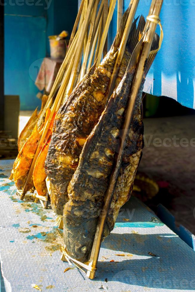 grilled fish, grilled fish nile Tilapia grilled on hot charcoal photo