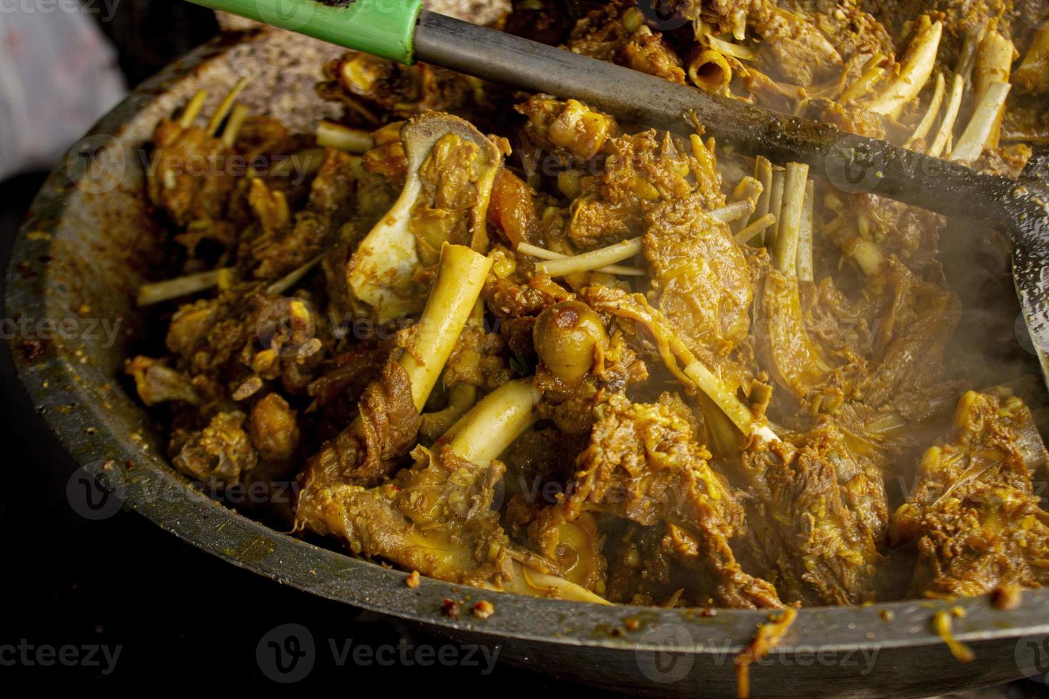 tengkleng kambing or goat tengkleng is a kind of soup with the main ingredient of goat bones. tengkleng like curry with goat bone material photo