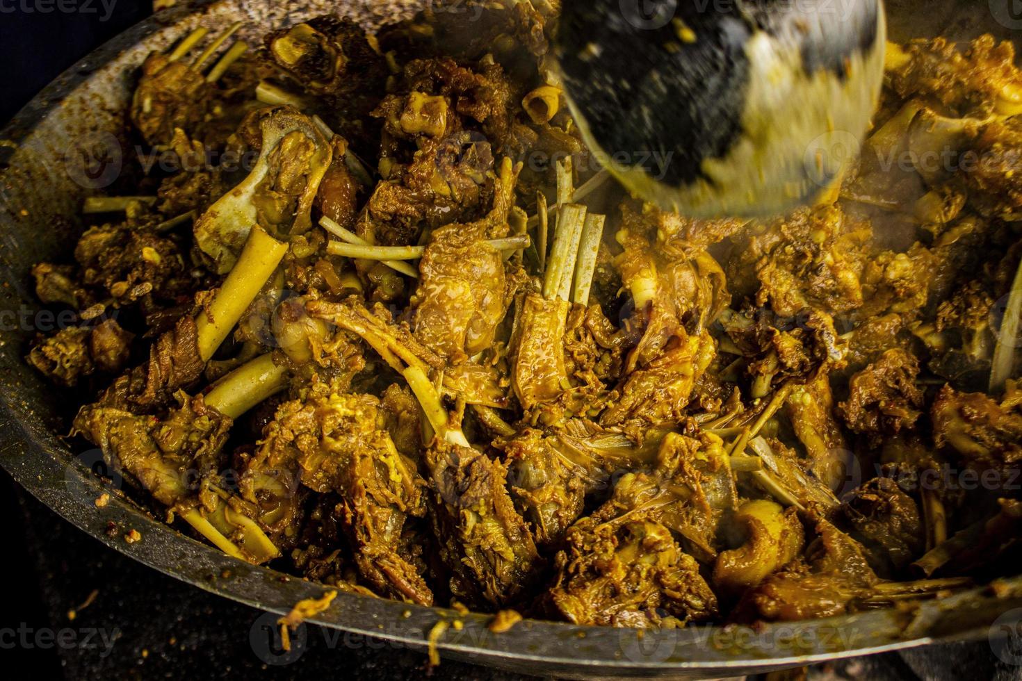 tengkleng kambing or goat tengkleng is a kind of soup with the main ingredient of goat bones. tengkleng like curry with goat bone material photo