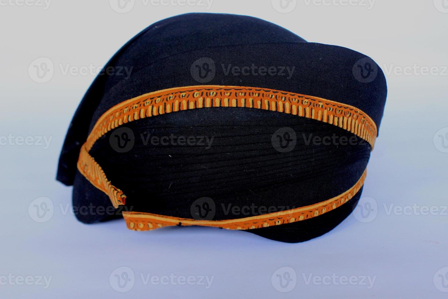 blangkon hitam or black blangkon a traditional hat Javanese men. isolated on white background photo