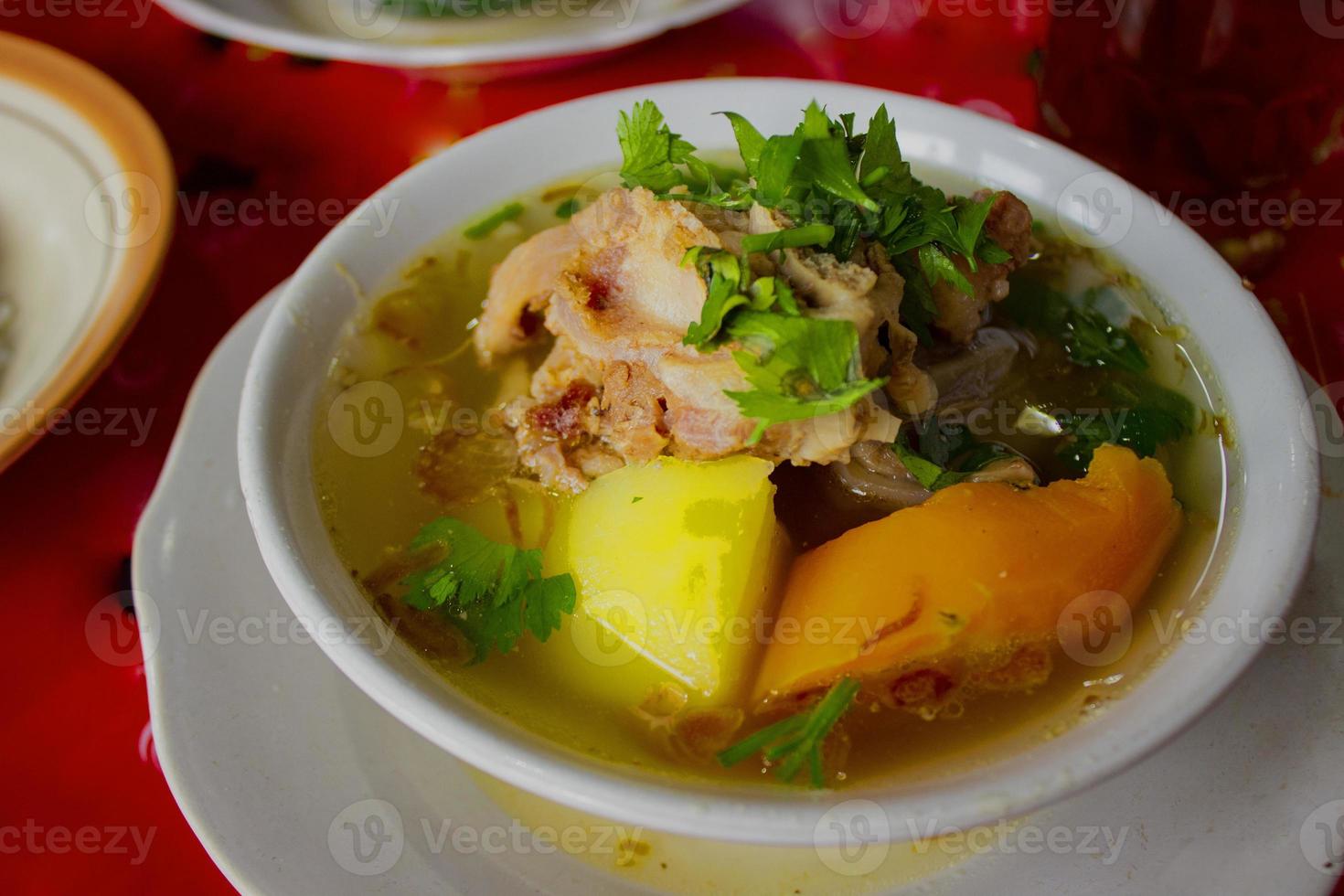 sop buntut or oxtail soup or tail soup is traditional soup made from tail ox, Boiled with Spices photo