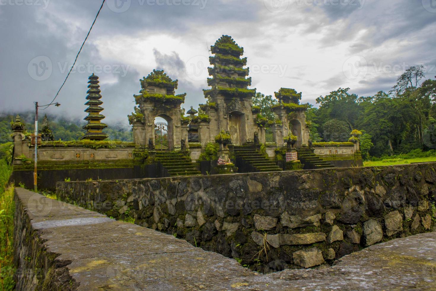 hindu temple ruins of Pura Hulun Danu at the Tamblingan lake, Bali, Indonesia photo