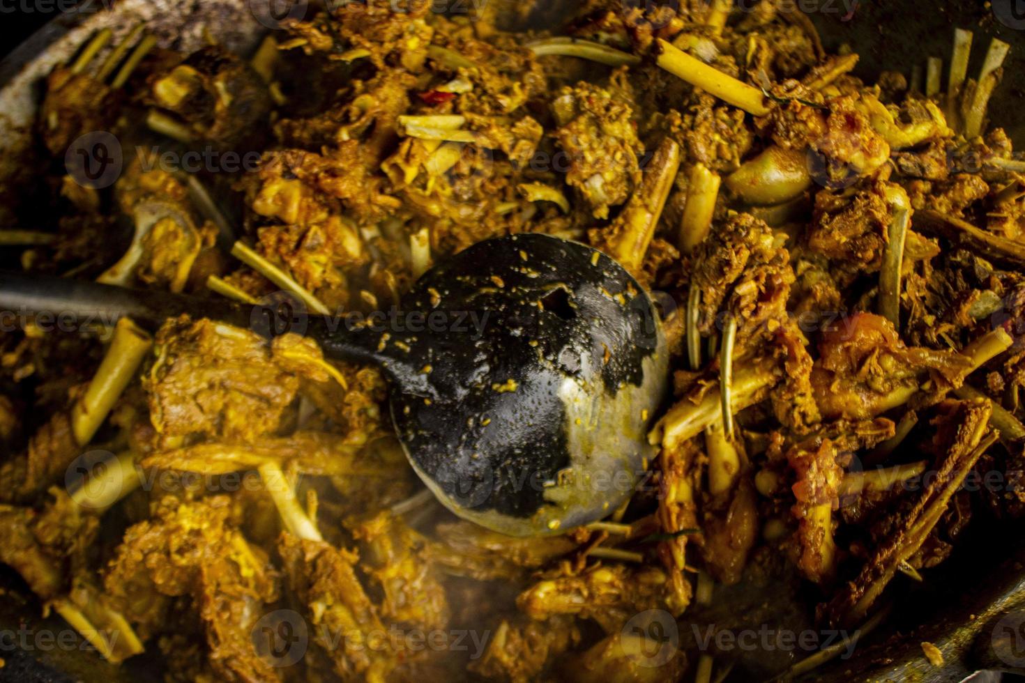 tengkleng kambing or goat tengkleng is a kind of soup with the main ingredient of goat bones. tengkleng like curry with goat bone material photo