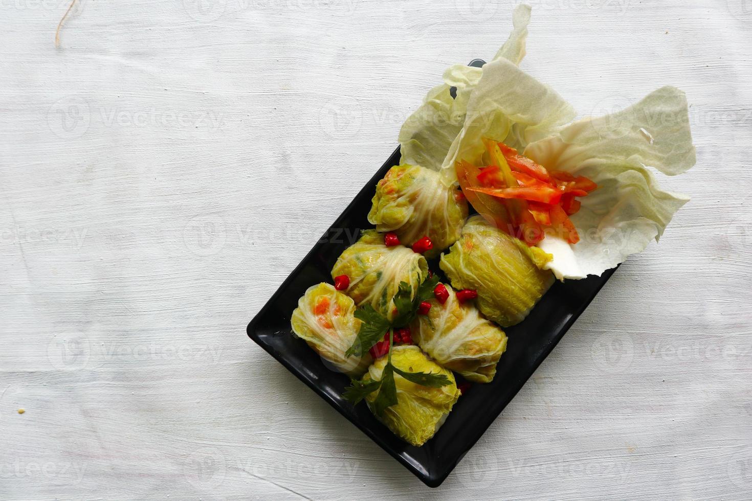 cabbage rolls stuffed meat or kol gulung, kelem dolmasi, sarma Cabbage wraps, Chou farci, golubtsy, golabki. cooked cabbage leaves wrapped with meat, or beef. photo