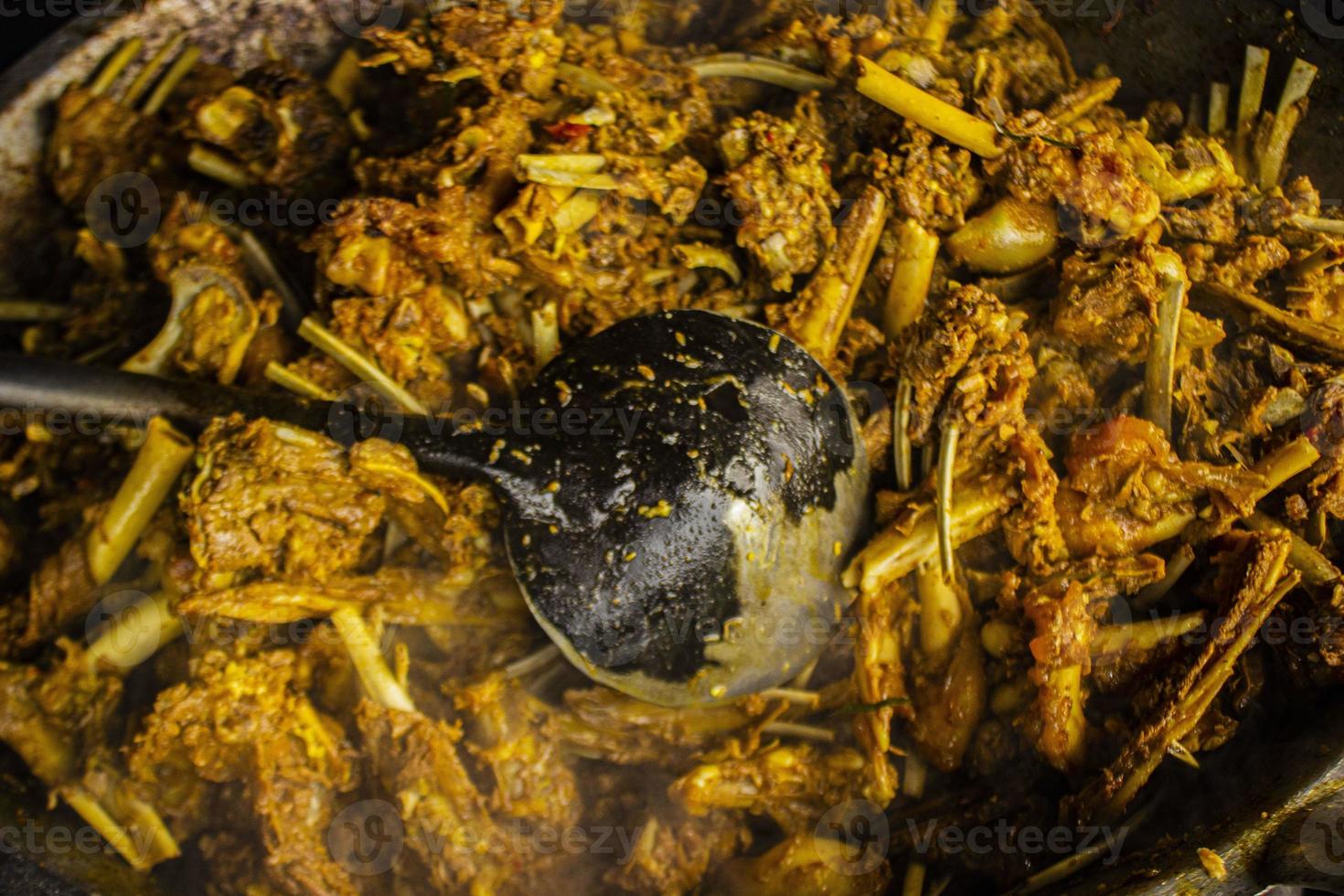 tengkleng kambing or goat tengkleng is a kind of soup with the main ingredient of goat bones. tengkleng like curry with goat bone material photo