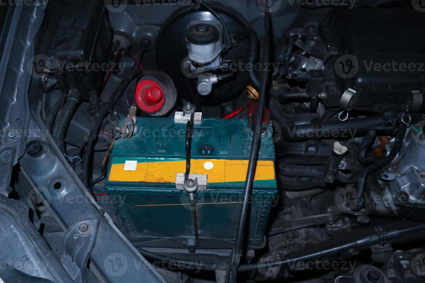 open hood car to check condition . See the radiator cooling panel Engine, Accu water, and electronic system thoroughly to repair engine to complete for use photo