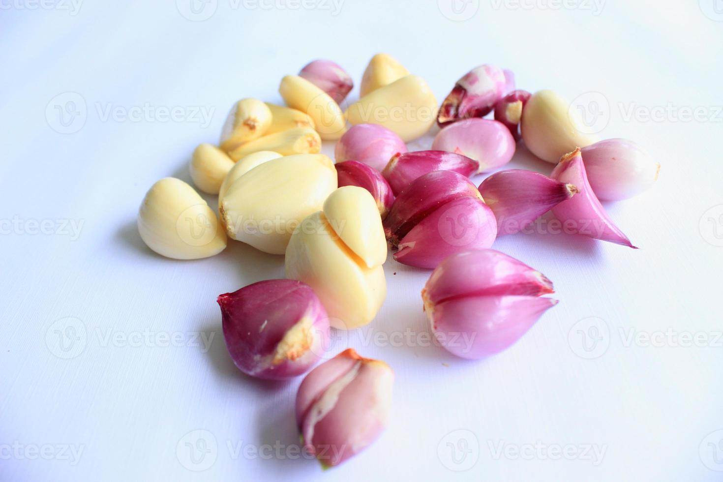 fresh red onion and garlic on white background fresh red onion and