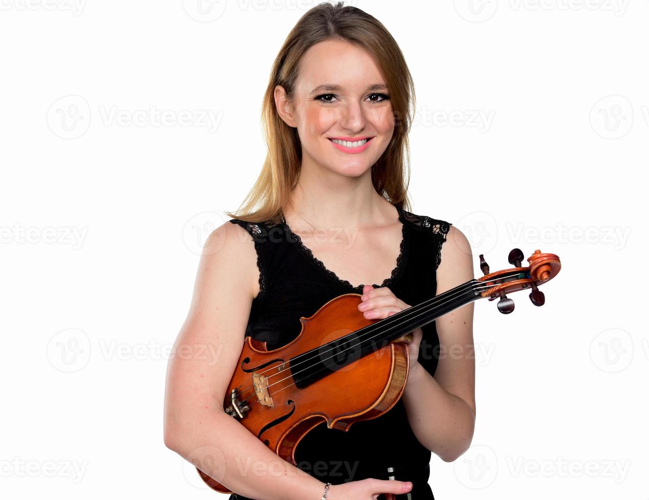 Beautiful natural blond girl playing violin. isolated on white photo