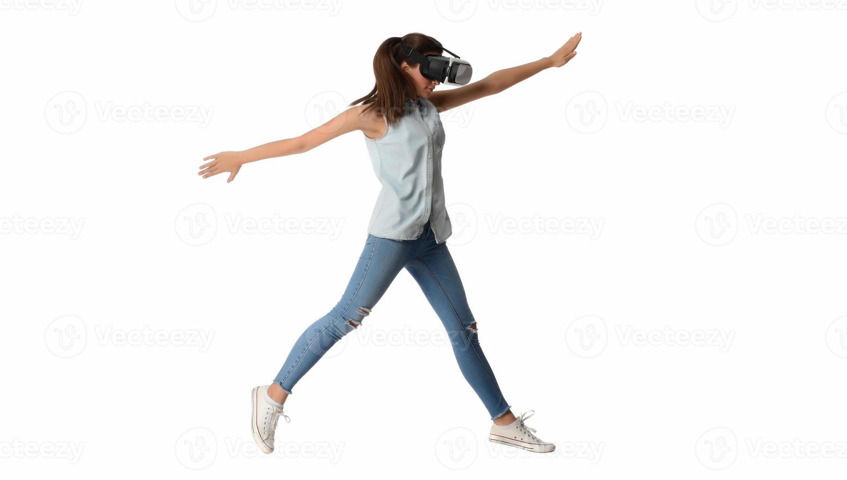 Pretty cute excited female in VR headset looking up and trying to touch objects in virtual reality photo