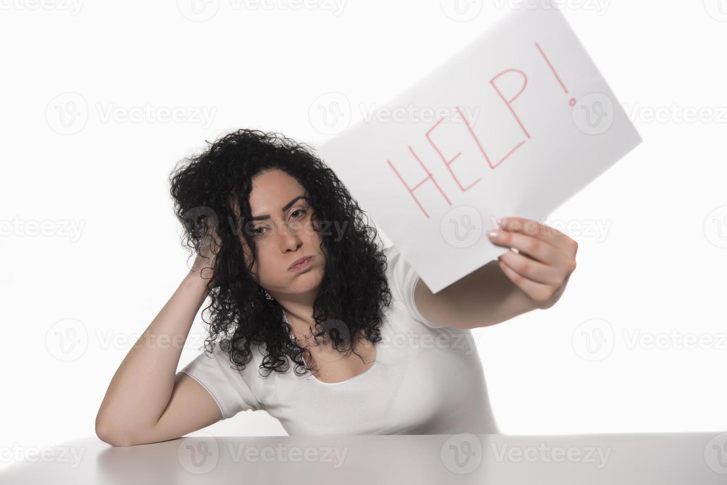 woman holding HELP sign. photo
