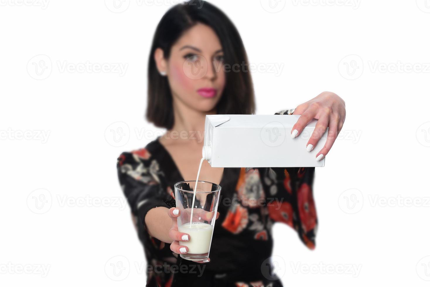 woman holding and drinking milk. photo