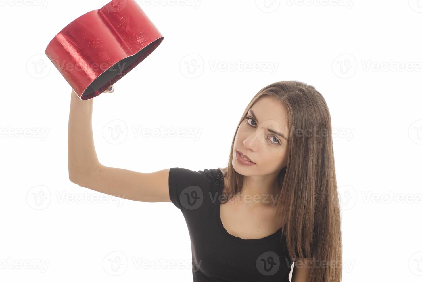 Beautiful woman holding big gift box photo