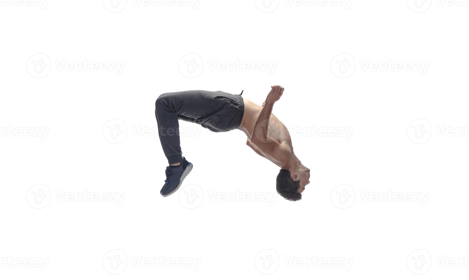 male model doing break dance routine. isolated on white background photo