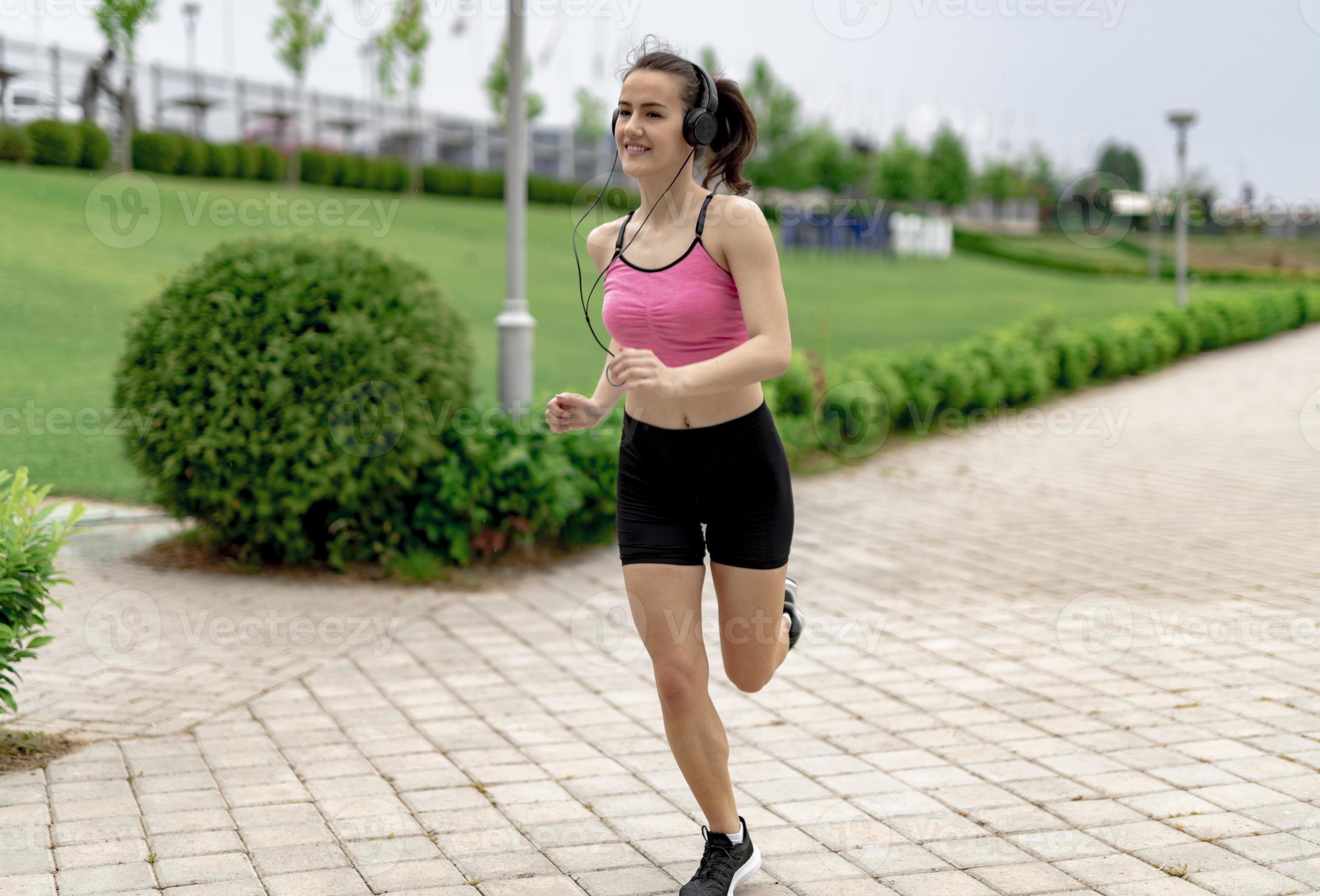 Sports Woman jogging down at urban outdoor trail. 15976065 Stock Photo