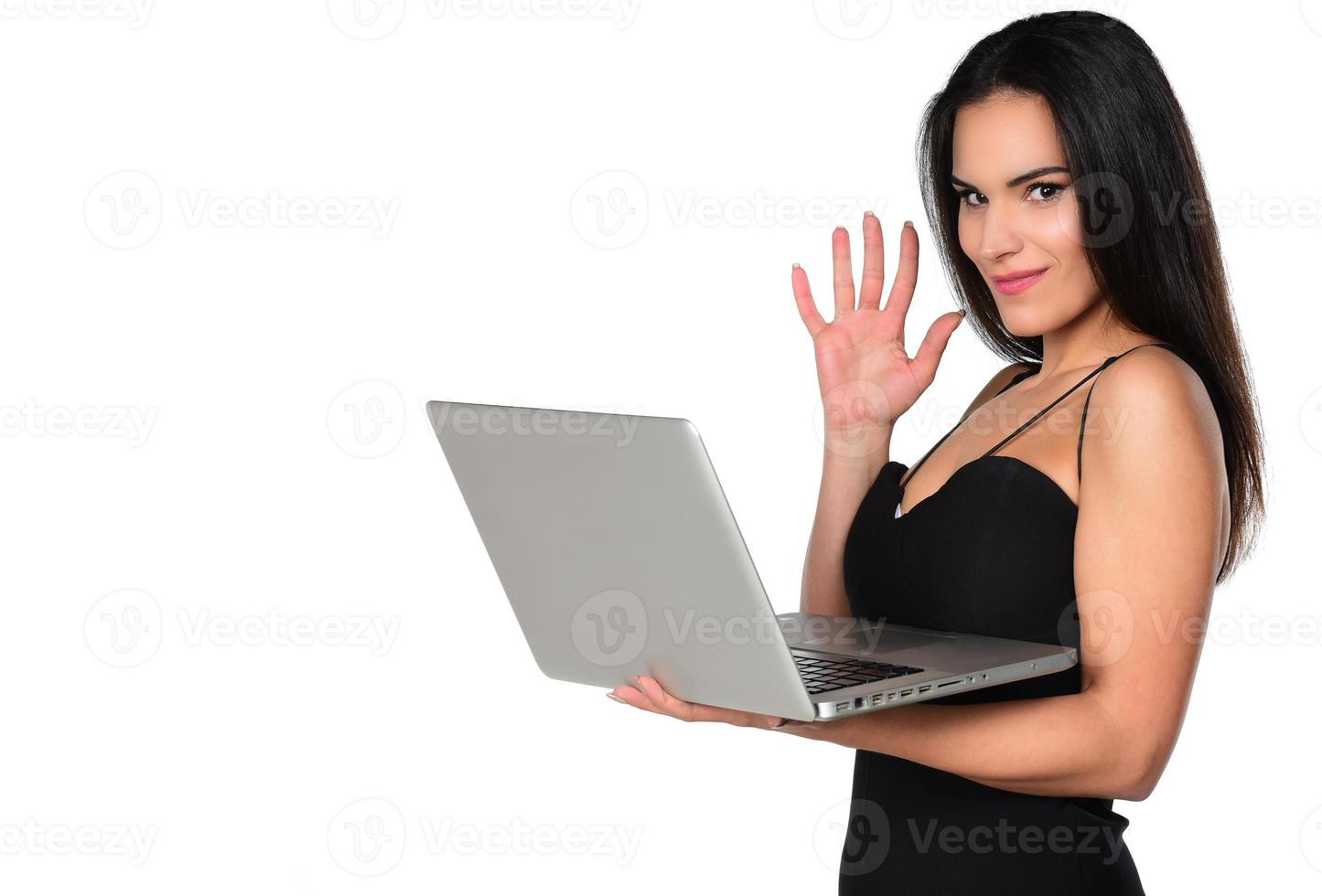 beautiful smiling woman holding laptop computer photo