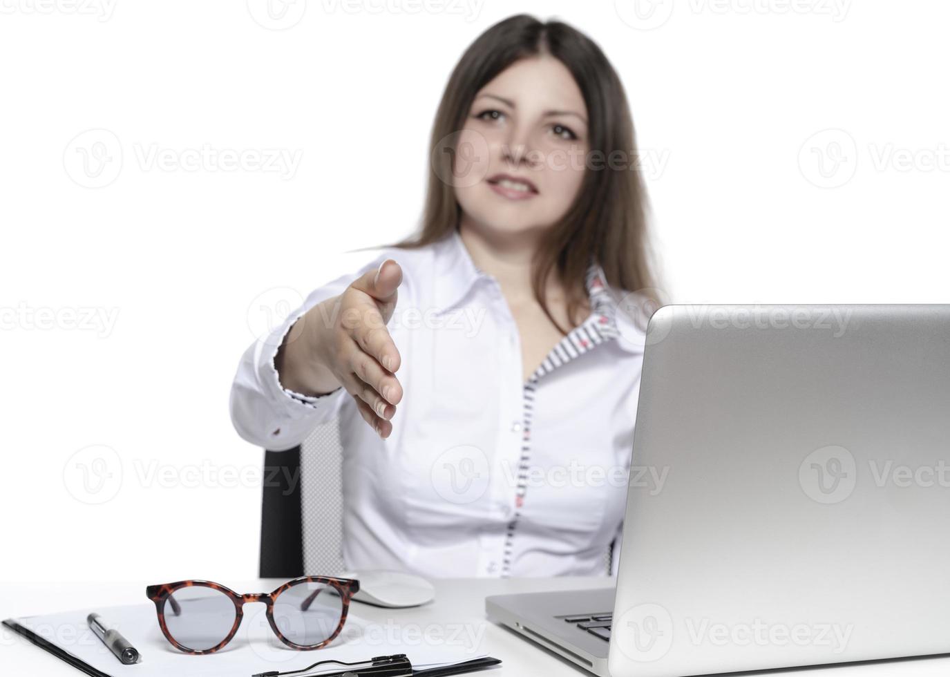 beautiful female model working on a laptop photo