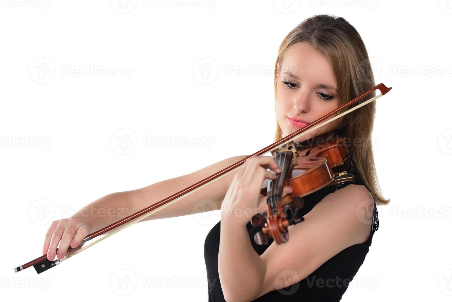 Beautiful natural blond girl playing violin. isolated on white photo