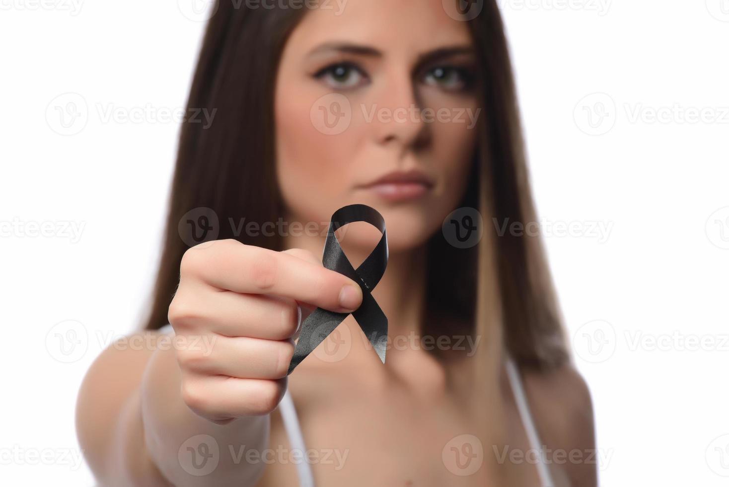 beautiful woman holding black ribbon on white background mourning awareness sign photo