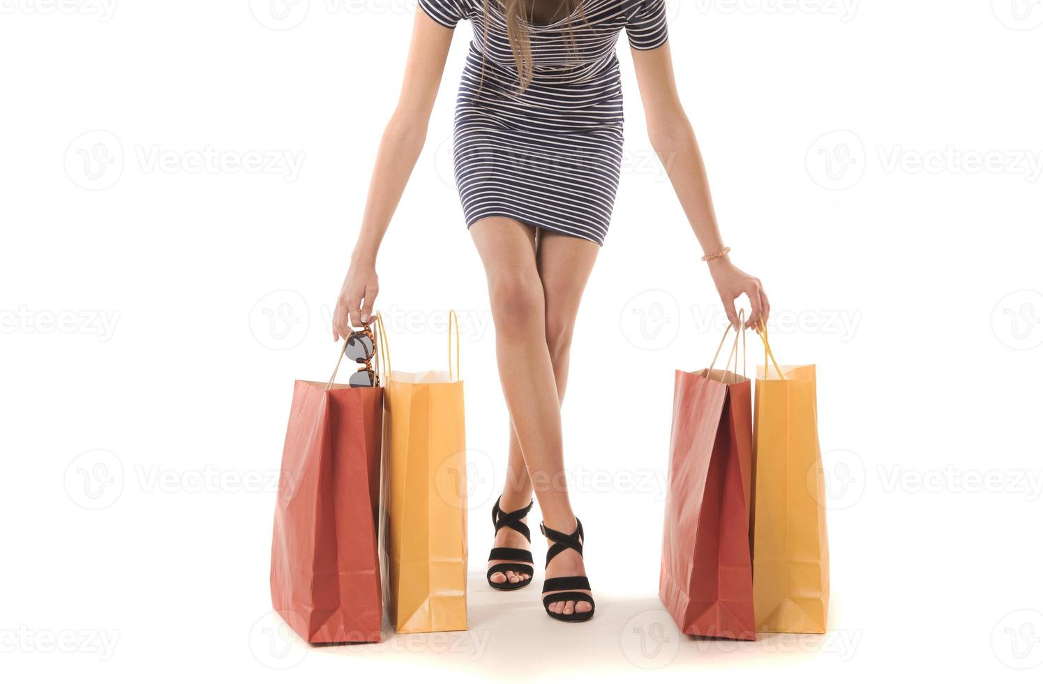 Young Modern Beautiful woman with a lot of shopping bags photo