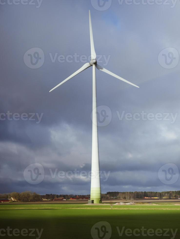 Wind turbines on sunny morning photo