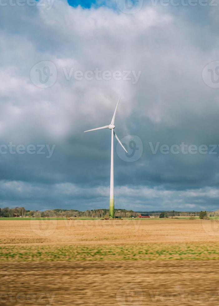 Wind turbines on sunny morning photo