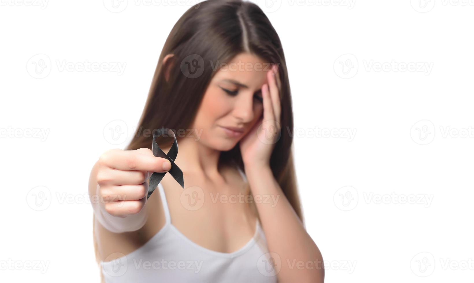 beautiful woman holding black ribbon on white background mourning awareness sign photo