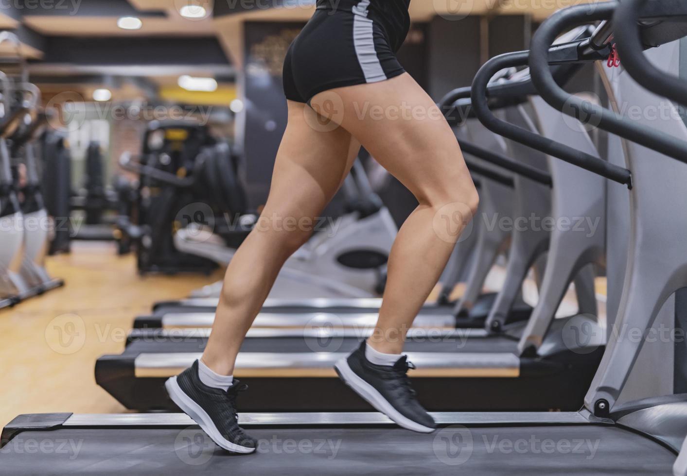 Woman doing a workout at the fitness gym. photo