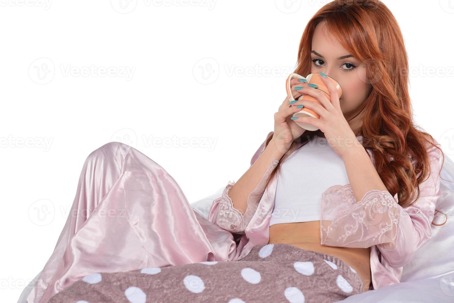 Beautiful woman drinking tea, drinking coffee, studio portrait photo