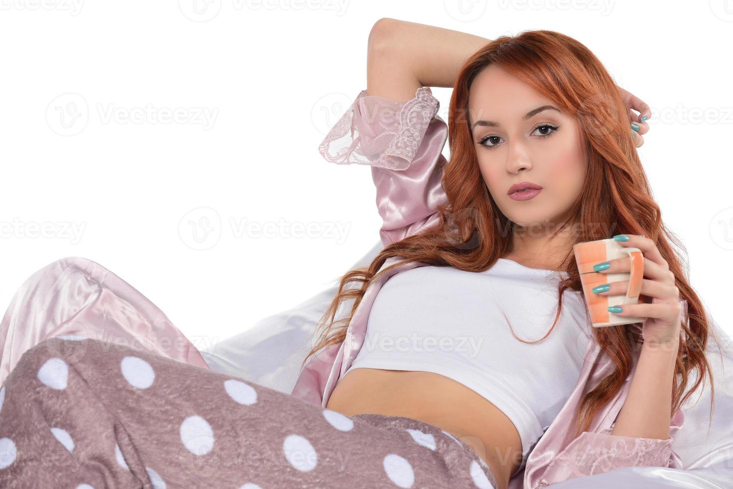 Beautiful woman drinking tea, drinking coffee, studio portrait photo