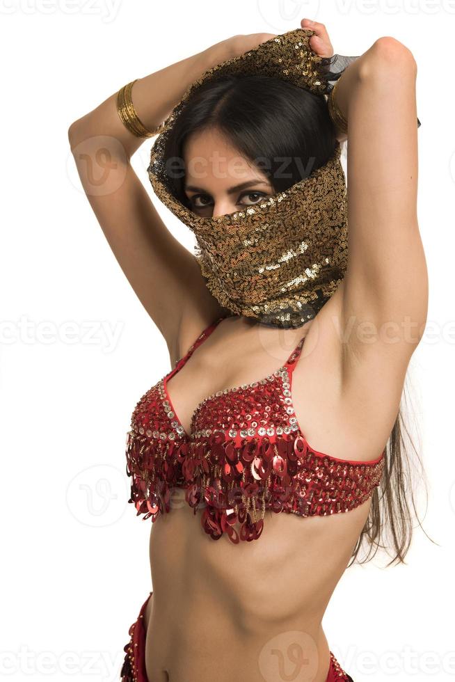 Beautiful belly dancer young woman in gorgeous red and black costume dress photo