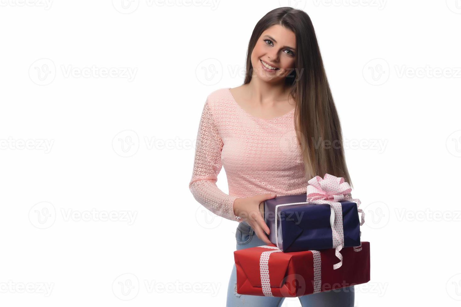 beautiful happy woman holding gift boxes photo