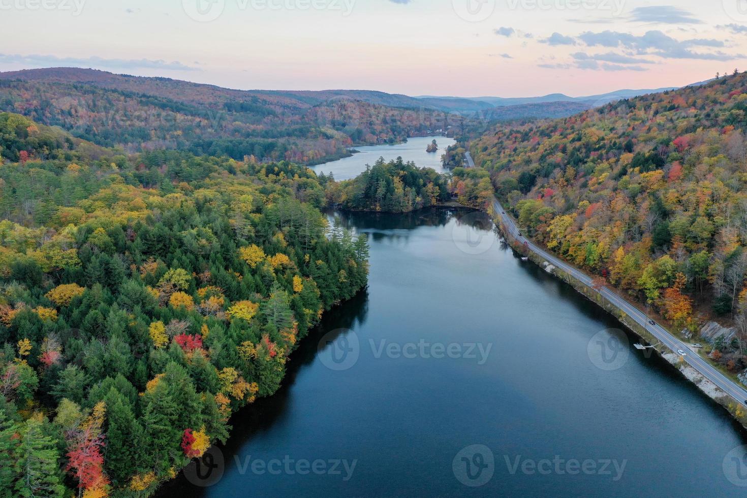 Aerial view of Amherst Lake in fall foliage in Plymouth, Vermont. photo