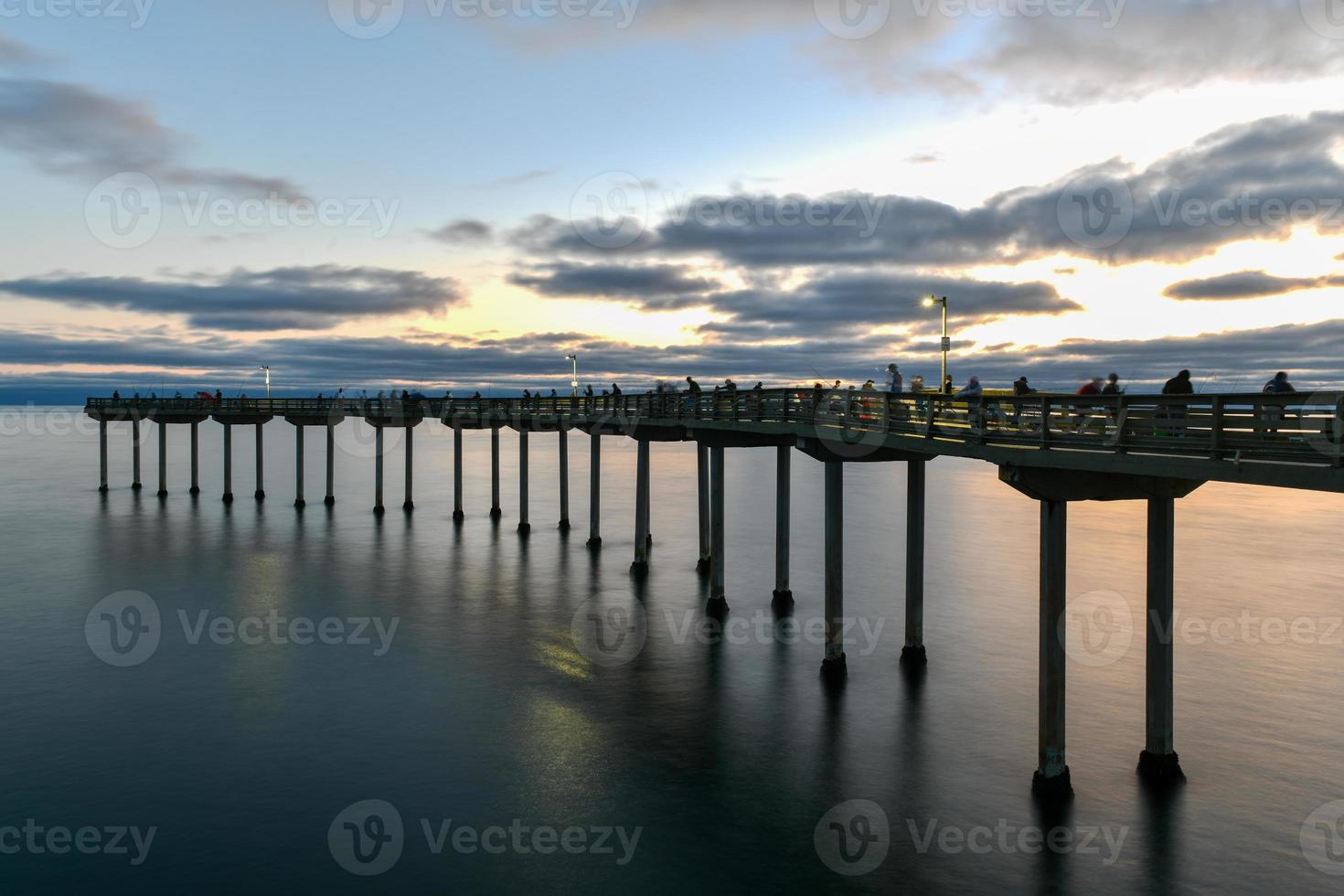 Sunset by the Ocean Beach Pier in San Diego, California. photo