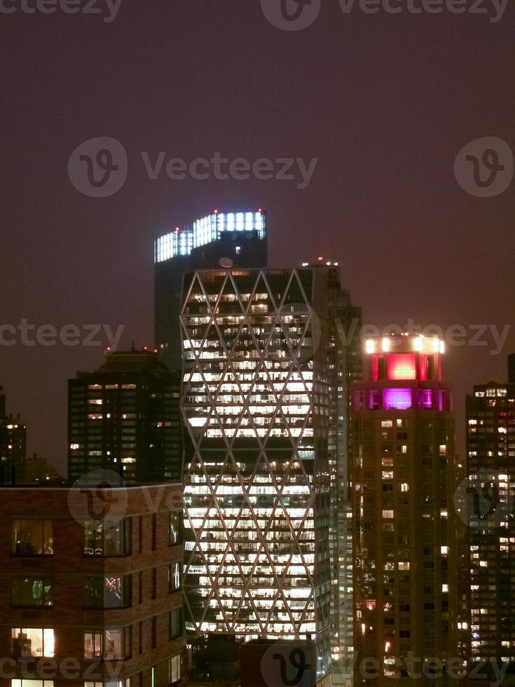 The skyline of Midtown Manhattan in the evening in New York City. photo