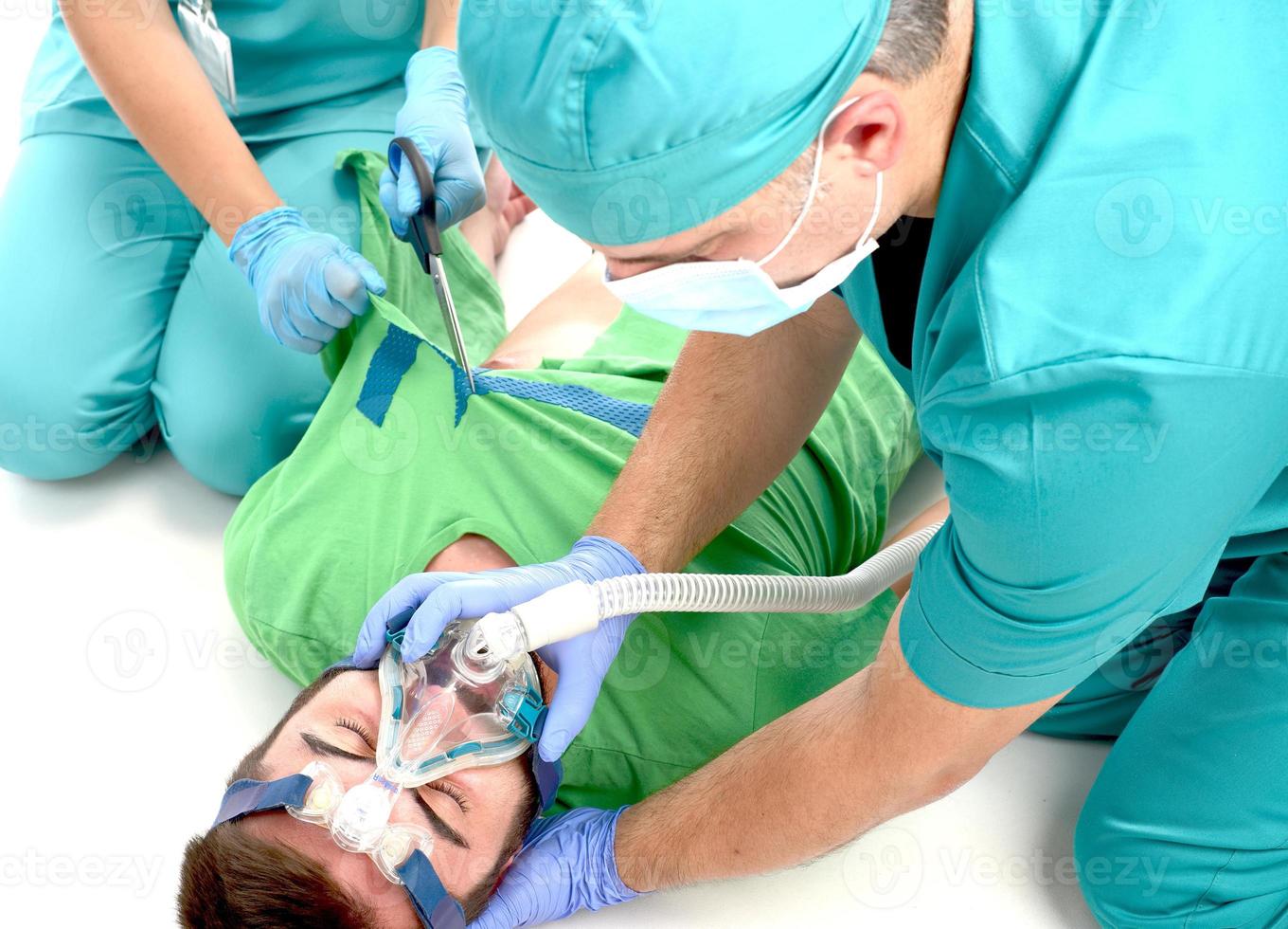 medical team giving CPR to covid 19 patient. photo