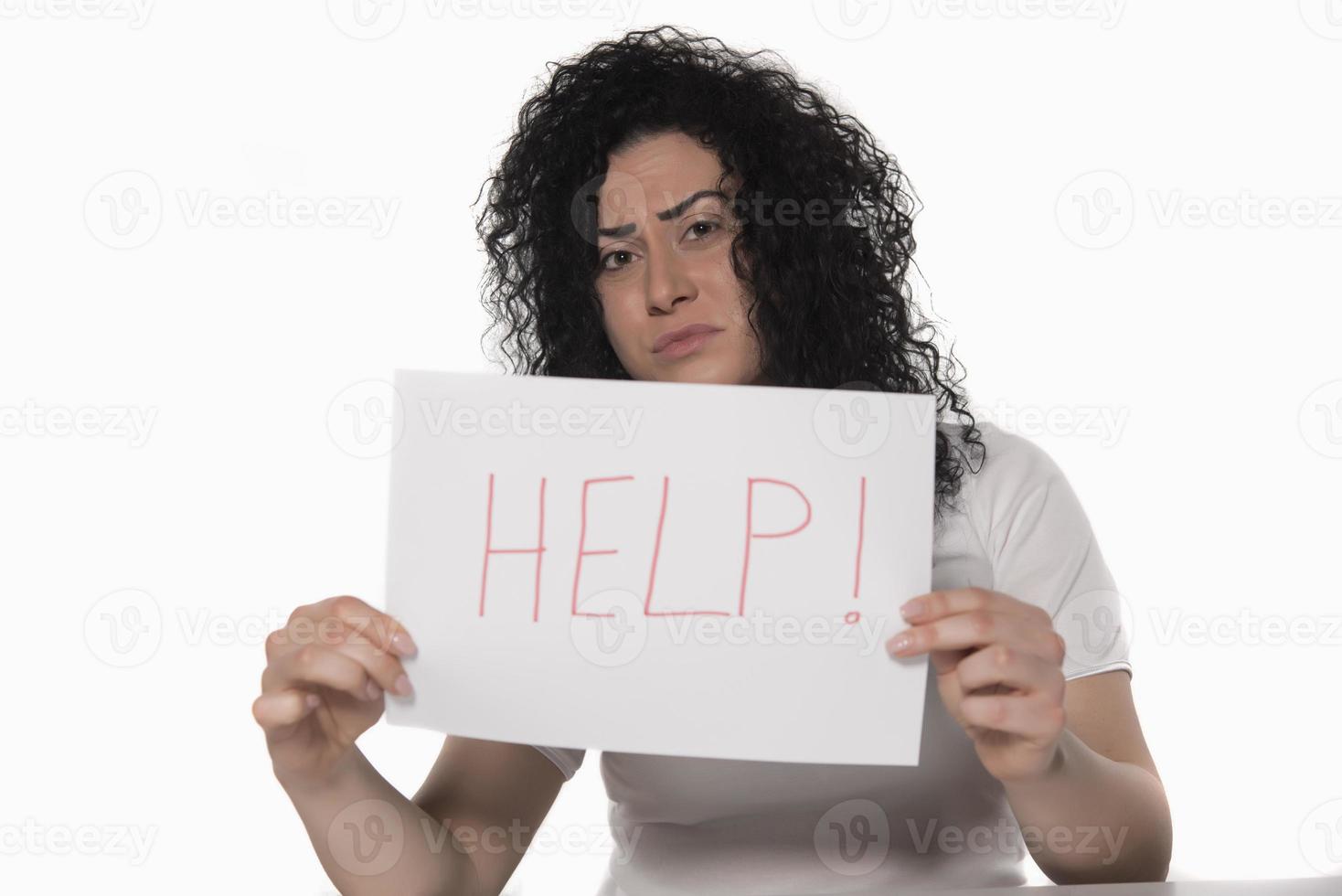 woman holding HELP sign. photo