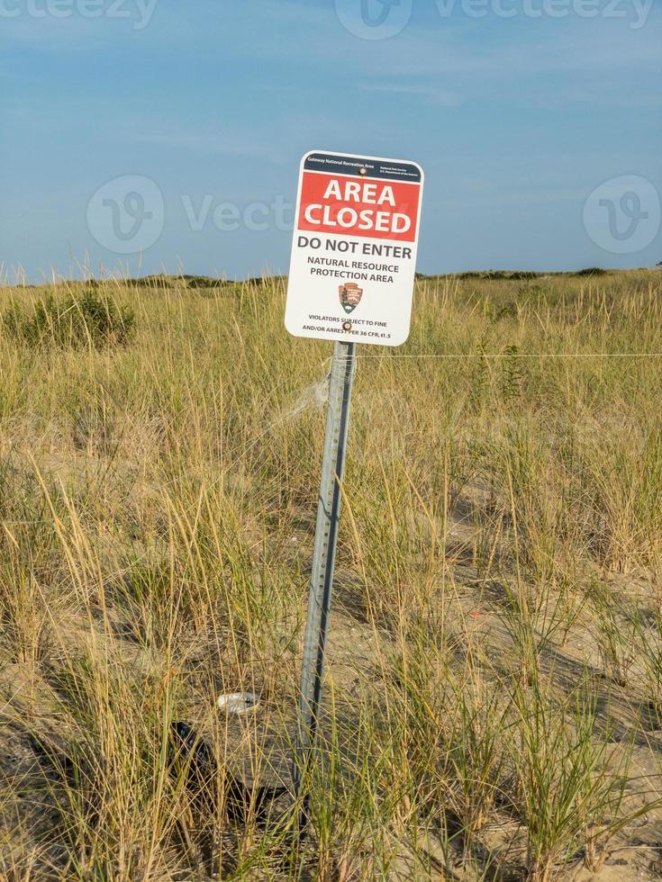 Area closed sign in Sandy Hook along the New Jersey shore. photo