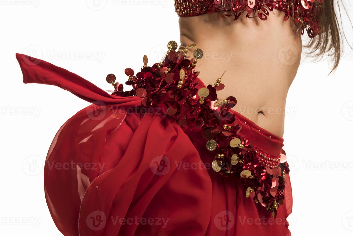 Beautiful belly dancer young woman in gorgeous red and black costume dress photo