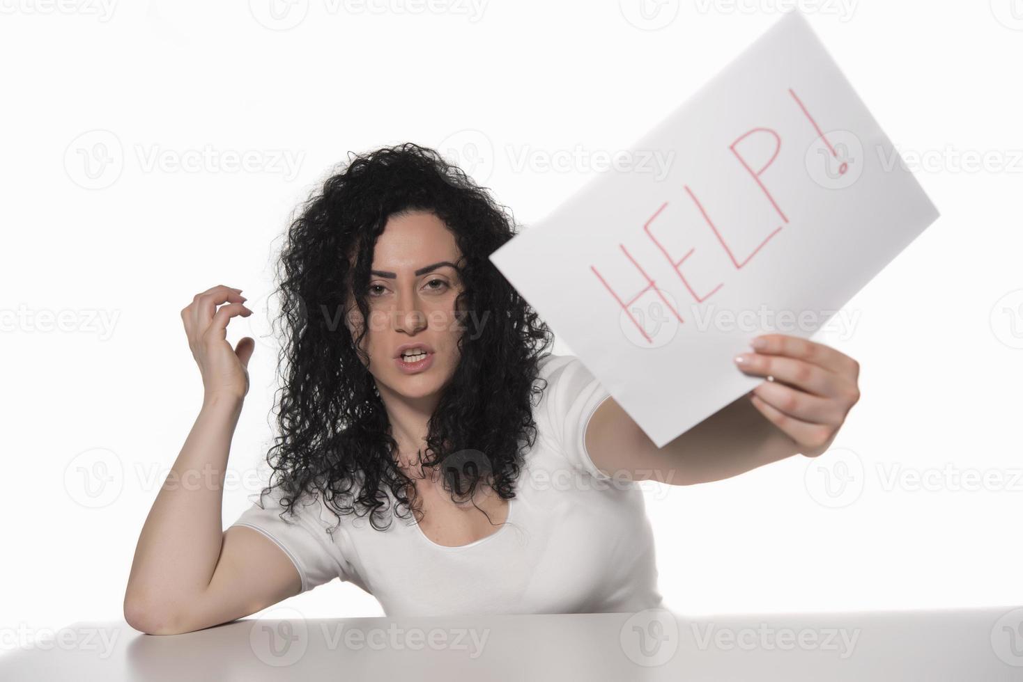 woman holding HELP sign. photo