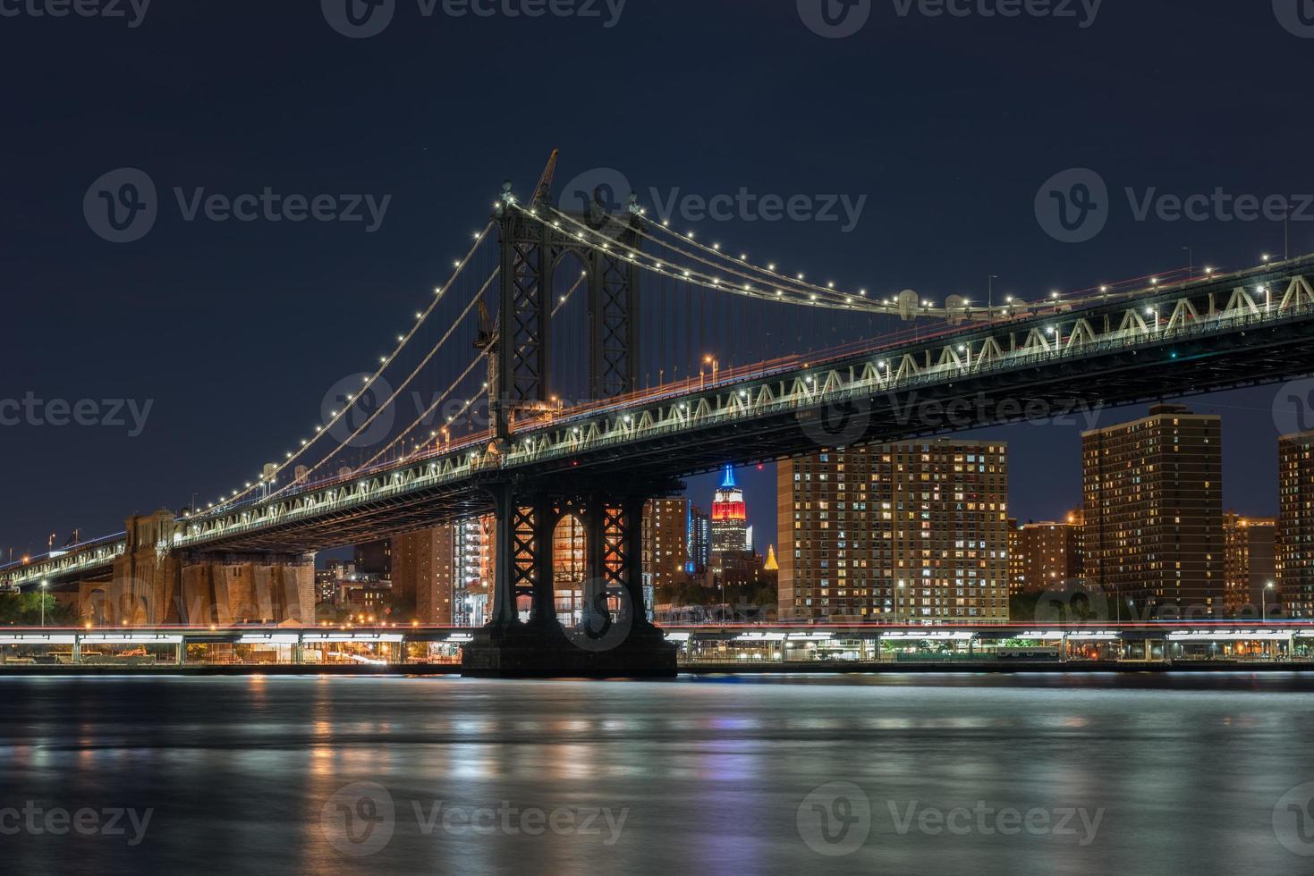 Manhattan Bridge view of Manhattan from Brookyn at night. photo