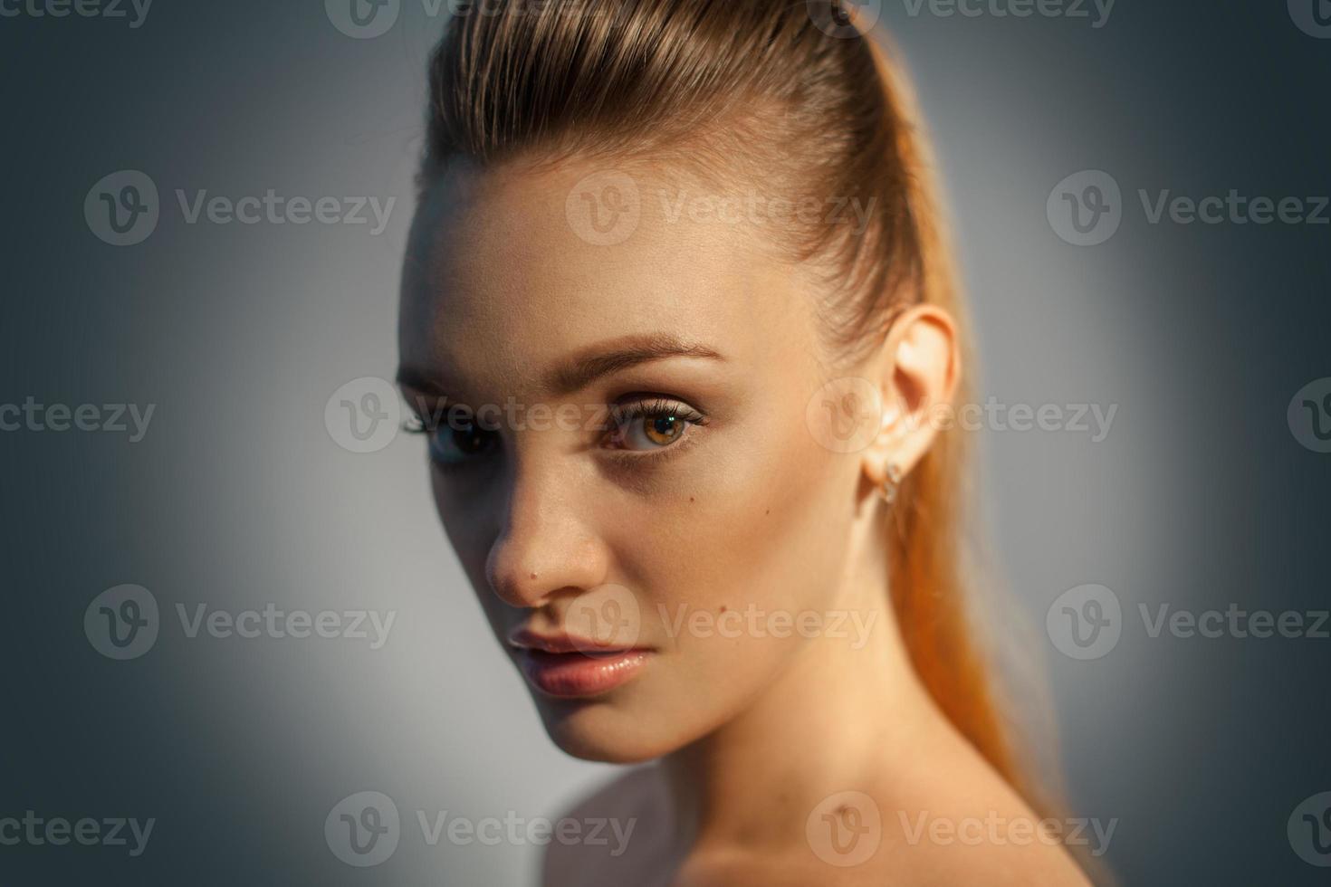 charming young girl in studio photo