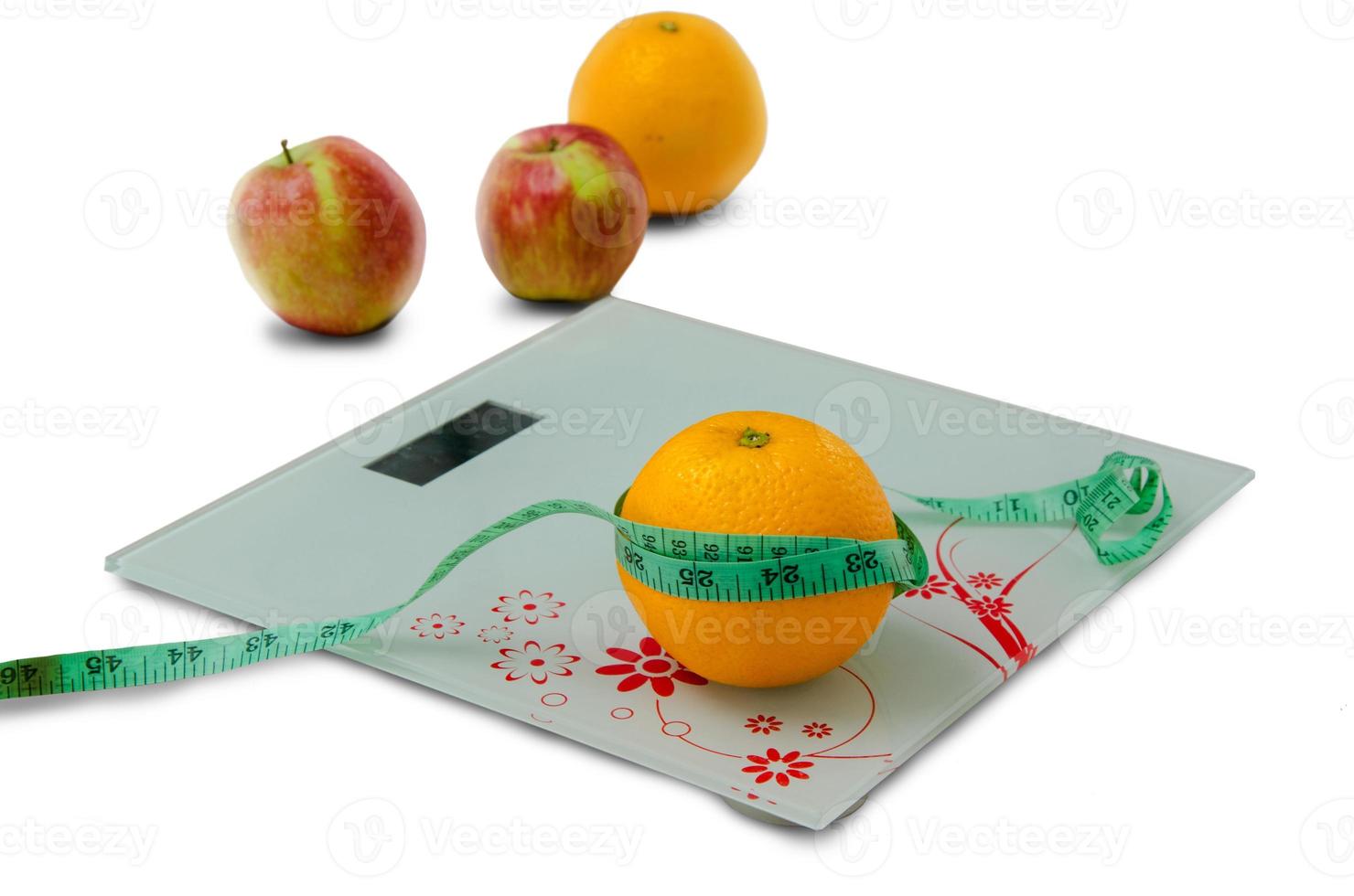 orange in a measuring tape photo