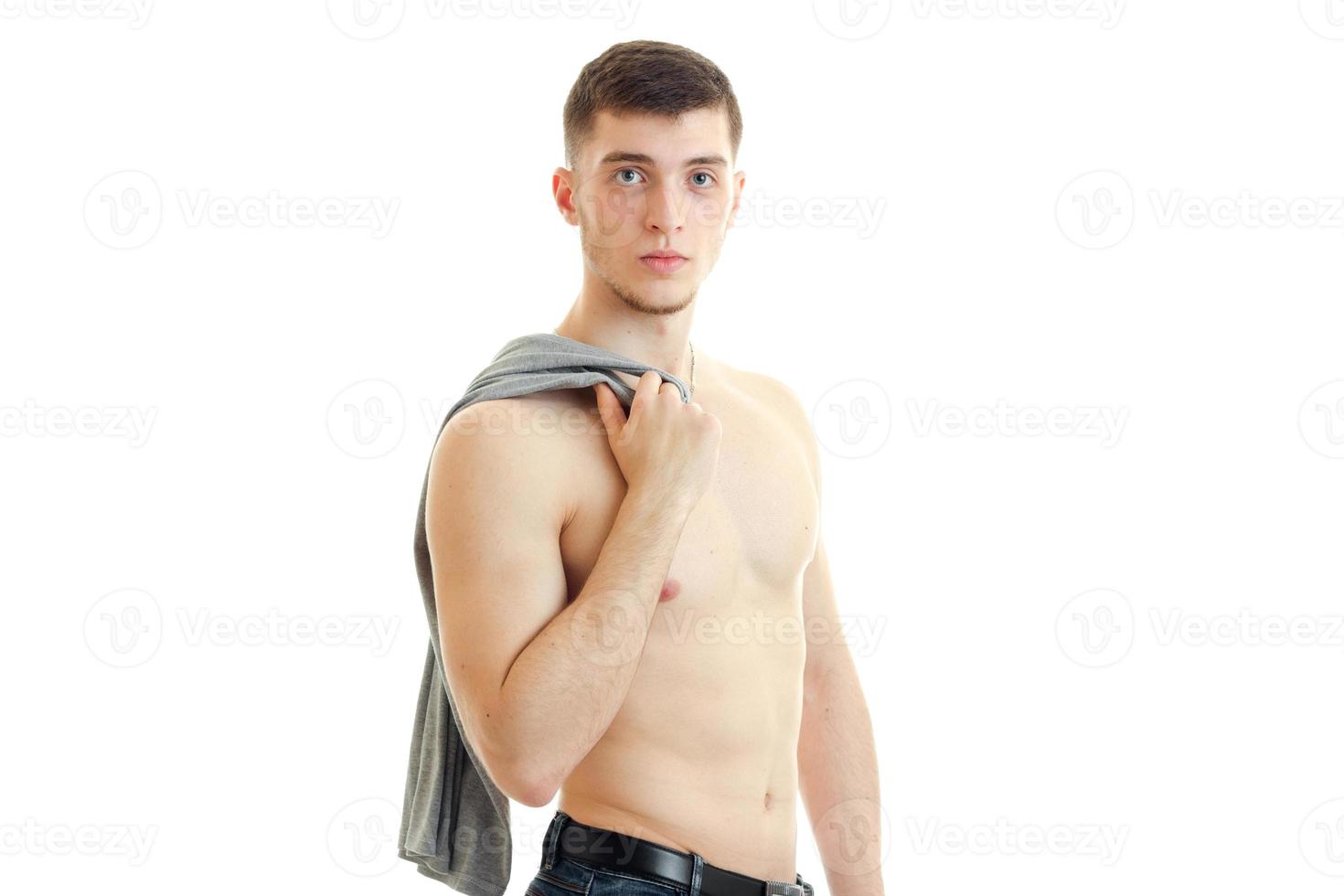 serious young topless man looking at the camera photo