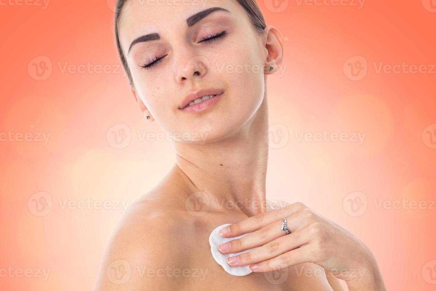 Young girl takes care her skin. photo