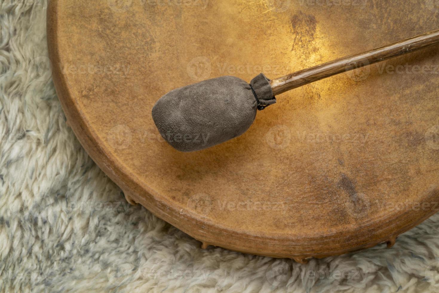 shaman frame drum with a beater photo