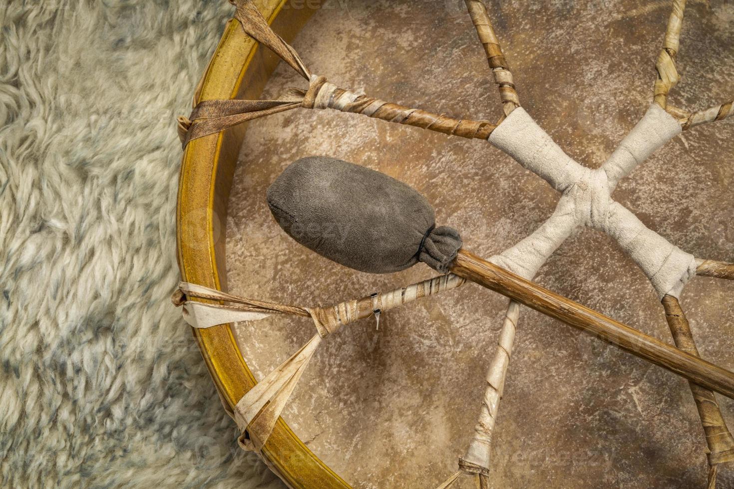 shaman frame drum with a beater photo