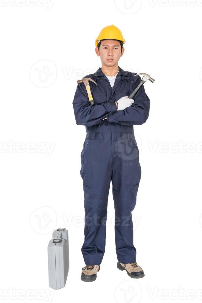 Young handyman  standing with his tool box photo